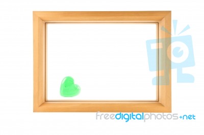 Wood Frame With Green Heart Stock Photo