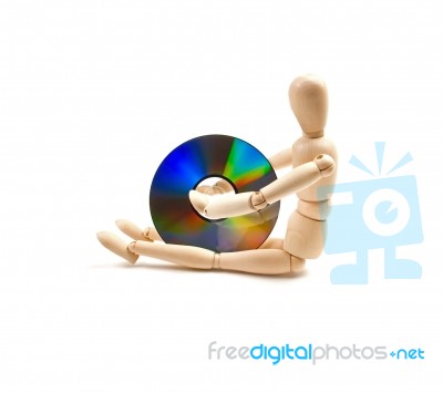 Wood Mannequin With Cd-rom Stock Photo