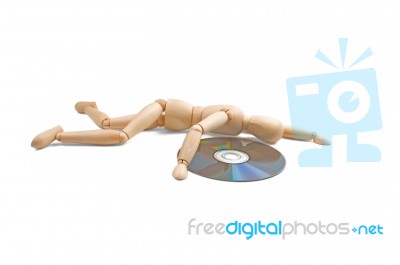 Wood Mannequin With Cd-rom Stock Photo