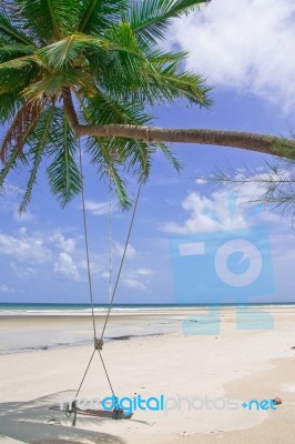 Wood Swing On Beach Stock Photo