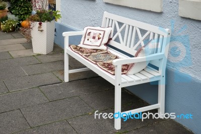 Wooden Bench Outside A House In Rothenburg Stock Photo