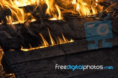 Wooden Board Engulfed In Flames Stock Photo