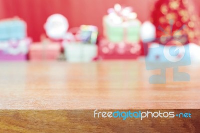 Wooden Board With Gift Boxes Stock Photo