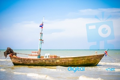 Wooden Boat On Water Stock Photo