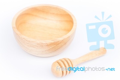 Wooden Bowl And Dipper On White Background Stock Photo