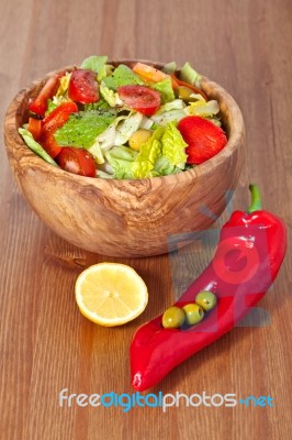 Wooden Bowl With Salad Stock Photo