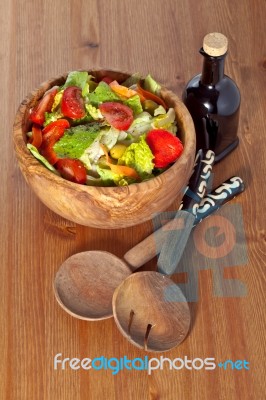 Wooden Bowl With Salad Stock Photo