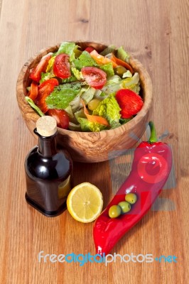 Wooden Bowl With Salad Stock Photo