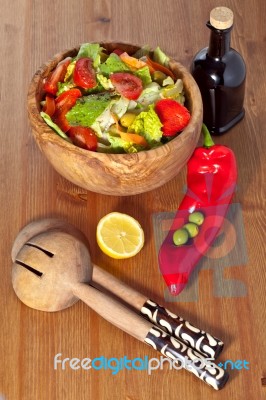 Wooden Bowl With Salad Stock Photo