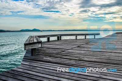 Wooden Bridge And Bench Stock Photo