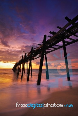 Wooden Bridge In Sea Stock Photo