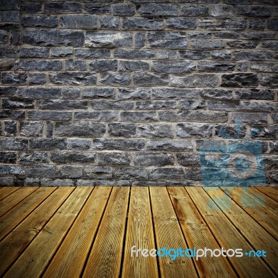 Wooden Deck Floor And Brick Wall Stock Photo