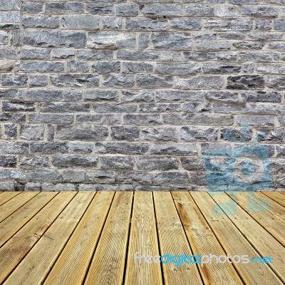 Wooden Deck Floor And Brick Wall Stock Photo