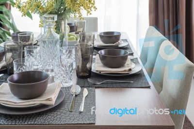 Wooden Dining Table With Table Set Stock Photo