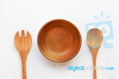 Wooden Dish Heart Shape With Spoon And Fork On White Background Stock Photo