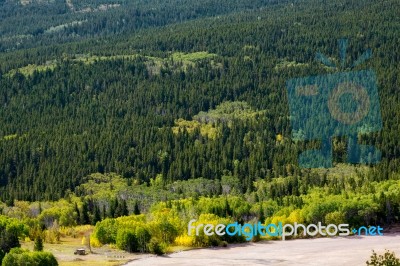 Wooden Hut Beside Lower Two Medicine Lake Stock Photo