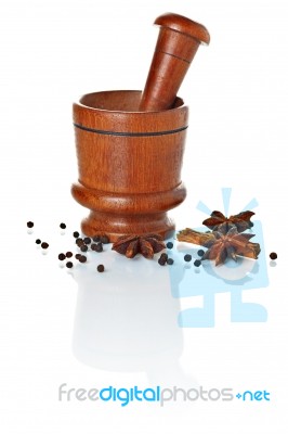 Wooden Mortar And Pestle With Spices Ready For Grinding Stock Photo