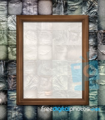 Wooden Picture Frame On Collage Jeans Stock Photo