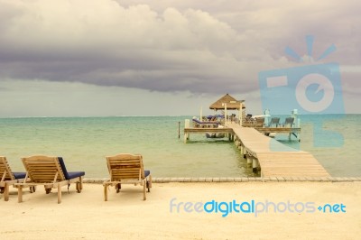 Wooden Pier Dock And Ocean View At Caye Caulker Belize Caribbean… Stock Photo