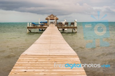 Wooden Pier Dock And Ocean View At Caye Caulker Belize Caribbean… Stock Photo