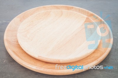 Wooden Plate On Grey Background Stock Photo