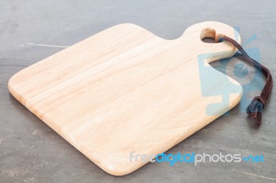 Wooden Plate On Grey Background Stock Photo