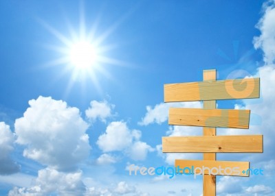 Wooden Sign With Sky Background Stock Photo