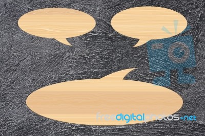 Wooden Speech Bubble On  Cement Background Stock Image