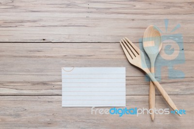 Wooden Spoon And Blank Menu Memo On Wood Background Stock Photo