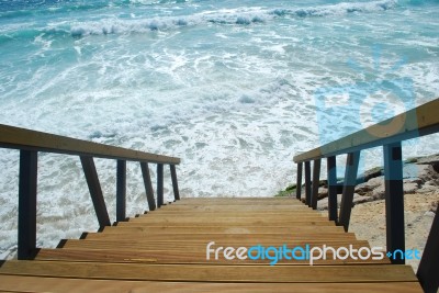 Wooden Stairs Or Path To The Bright Ocean Stock Photo