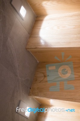 Wooden Stairs Step With Wall Light Stock Photo