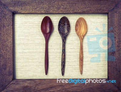 Wooden Tea Spoon Design In Wooden Frame Stock Photo