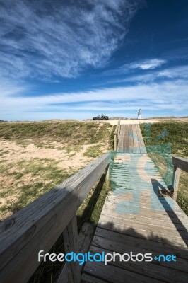 Wooden Walkway Across The Beach On The Uruguayan Eco-lake Garzon… Stock Photo