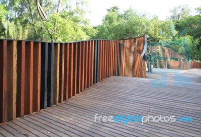 Wooden Walkway In The Park Stock Photo