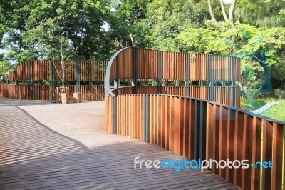 Wooden Walkway In The Park Stock Photo