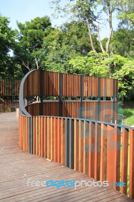 Wooden Walkway In The Park Stock Photo