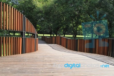 Wooden Walkway In The Park Stock Photo