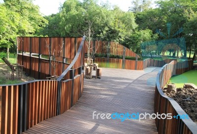 Wooden Walkway In The Park Stock Photo