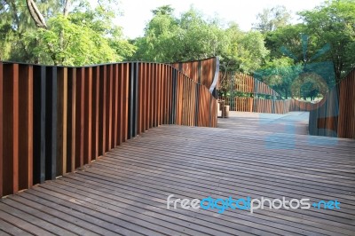 Wooden Walkway In The Park Stock Photo