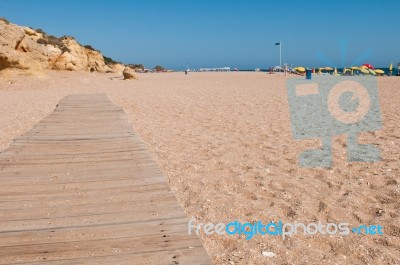 Wooden Walkway On Beach Stock Photo