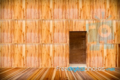 Wooden Wall With Door And Wood Floor In Front Off Stock Photo