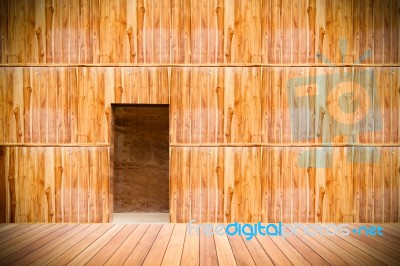 Wooden Wall With Door And Wood Floor In Front Off Stock Photo