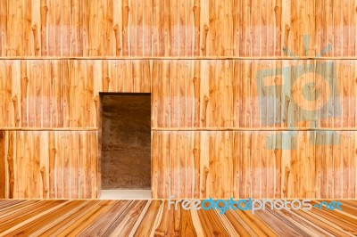 Wooden Wall With Door And Wood Floor In Front Off Stock Photo