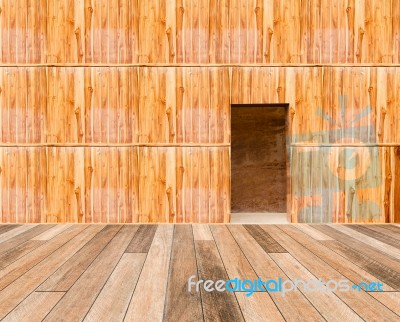 Wooden Wall With Door And Wood Floor In Front Off Stock Photo