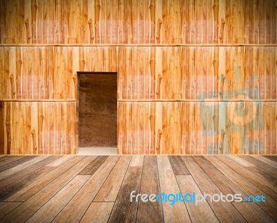 Wooden Wall With Door And Wood Floor In Front Off Stock Photo