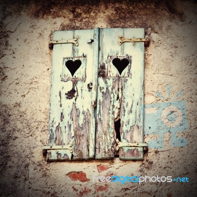 Wooden Window Shutters With Heart Shape Stock Photo