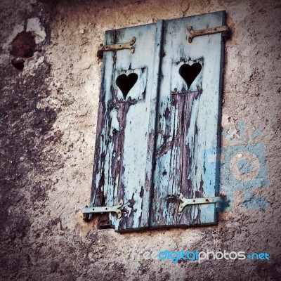 Wooden Window Shutters With Heart Shape Stock Photo