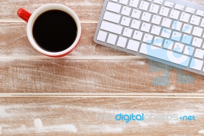 Wooden Work Desk With Keyboard Stock Photo