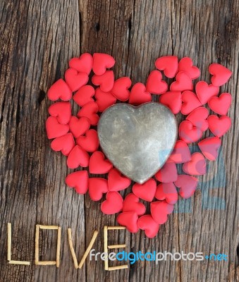 Word Love With Red And Metal Heart Shaped Valentines Day Stock Photo