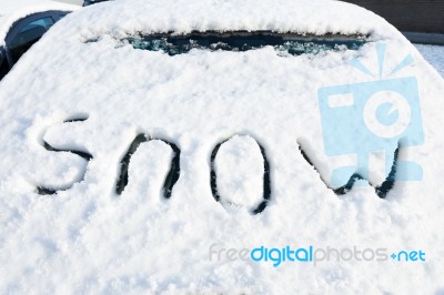 Word Snow On Windshield Of Car Stock Photo